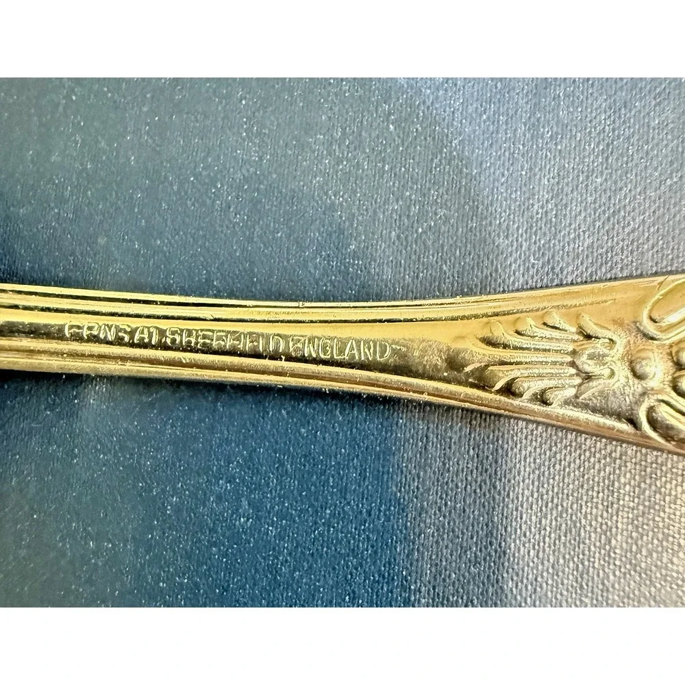 sheffield england silverplated berry ladle shell pattern
